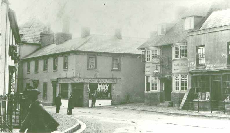 Early photo of the Square, Caerleon. Richardsons family butchers and the White Hart.