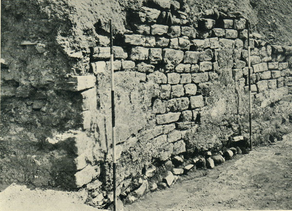 Excavation of Caerleon Amphitheatre 1926 - 1927. The arena wall east of entrance F, showing cement rendering.