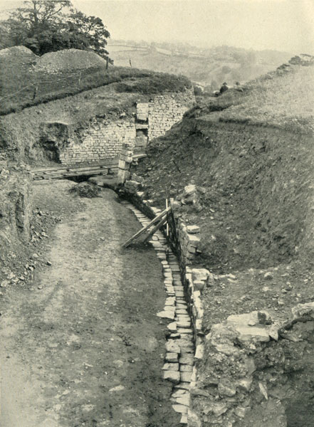 Excavation of Caerleon Amphitheatre 1926 - 1927. Arena floor and gutter, looking towards entrance B.