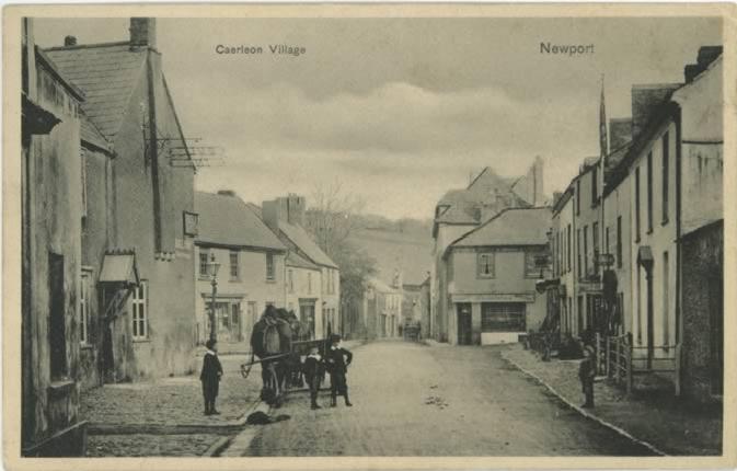 Early postcard view of the square, Caerleon. Title on the card says "Caerleon Village" Newport. Published by Stewart & Woolf. Series 1033.