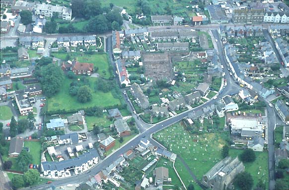 Aerial photograph of the Roman gates excavation, Caerleon.  It also shows much of the centre of the village including the church and Cambria House.