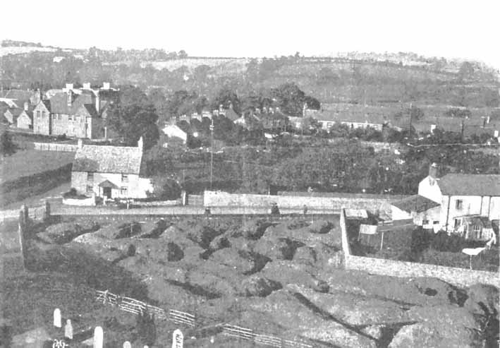 View from the tower of Saint Cadoc's Church Caerleon showing excavations prior to extension of graveyard.