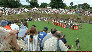 Crowds line the banks of the amphitheatre for a military display