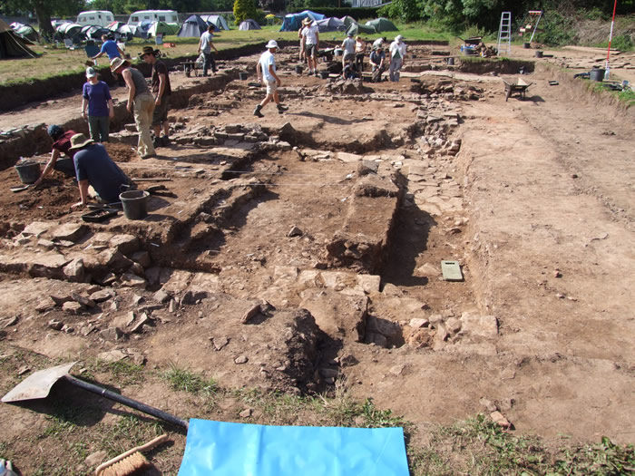 Rooms 1 and 2. Note cobbles running over foundation wall - possible doorway. Sept 2nd.