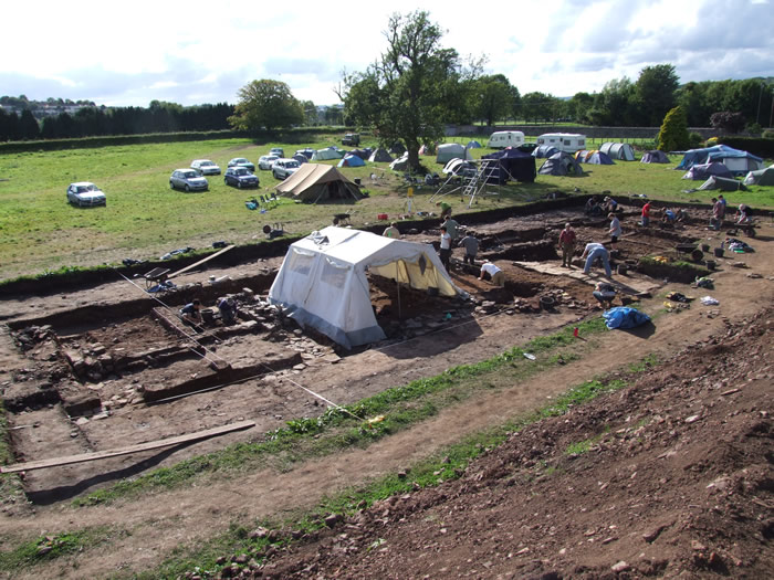 In the Dig Blog Dr Peter Guest reports that the deposits in rooms 1 and 2 "are producing large quantities of finds, especially iron and copper alloy objects as well as pottery and animal bone. The metal artefacts include some fabulous examples of Roman military equipment, such as scabbard chapes, belt plates, strap-ends and harness pendants, together with large lumps of iron which may need to be lifted in blocks and excavated later in the conservation laboratories. The coins we are finding still include later 3rd and 4th century bronze issues, but now we are beginning to recover more early coins including several silver denarii of the 1st and 2nd centuries. So, after almost 10 weeks of digging in 2008 and 2010 we are firmly within the Roman period and revealing lots of new information about Caerleon almost 2,000 years ago – amazing!" September 7th.