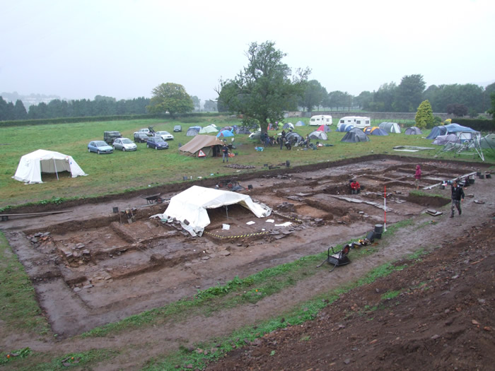 Heavy drizzle closed in. The lucky ones were in the tent over room 2 - they were dry and recovering interesting finds! September 9th. 